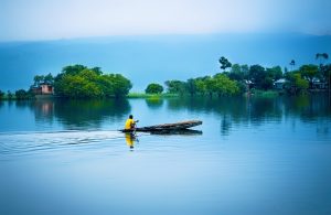 Chatsifieds Bangladesh man rowing a boat