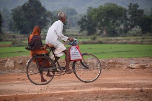 Chatsifieds Indian old couple riding on a bike