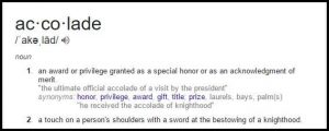 Learn English word Accolade and History