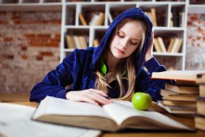 Young Woman study and reading Chatsifieds Learn English faster