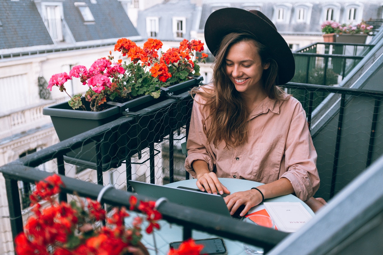 A young girl studying English in a cafe chatsifieds learn english faster